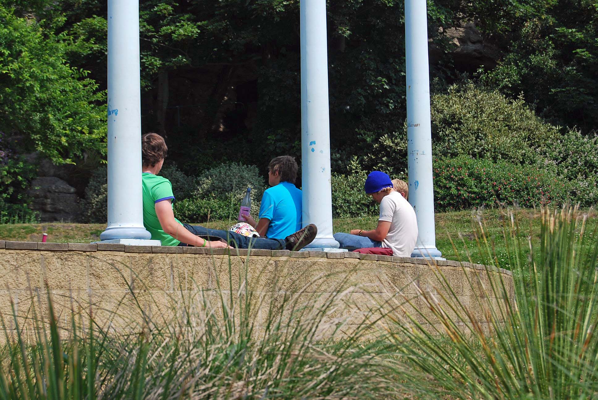 Teens sitting outside together