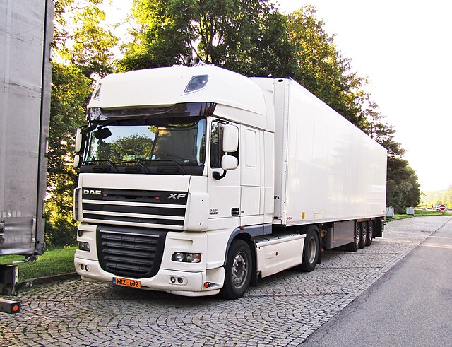 White 18 wheeler truck. Cyprus truck plate front KRZ692