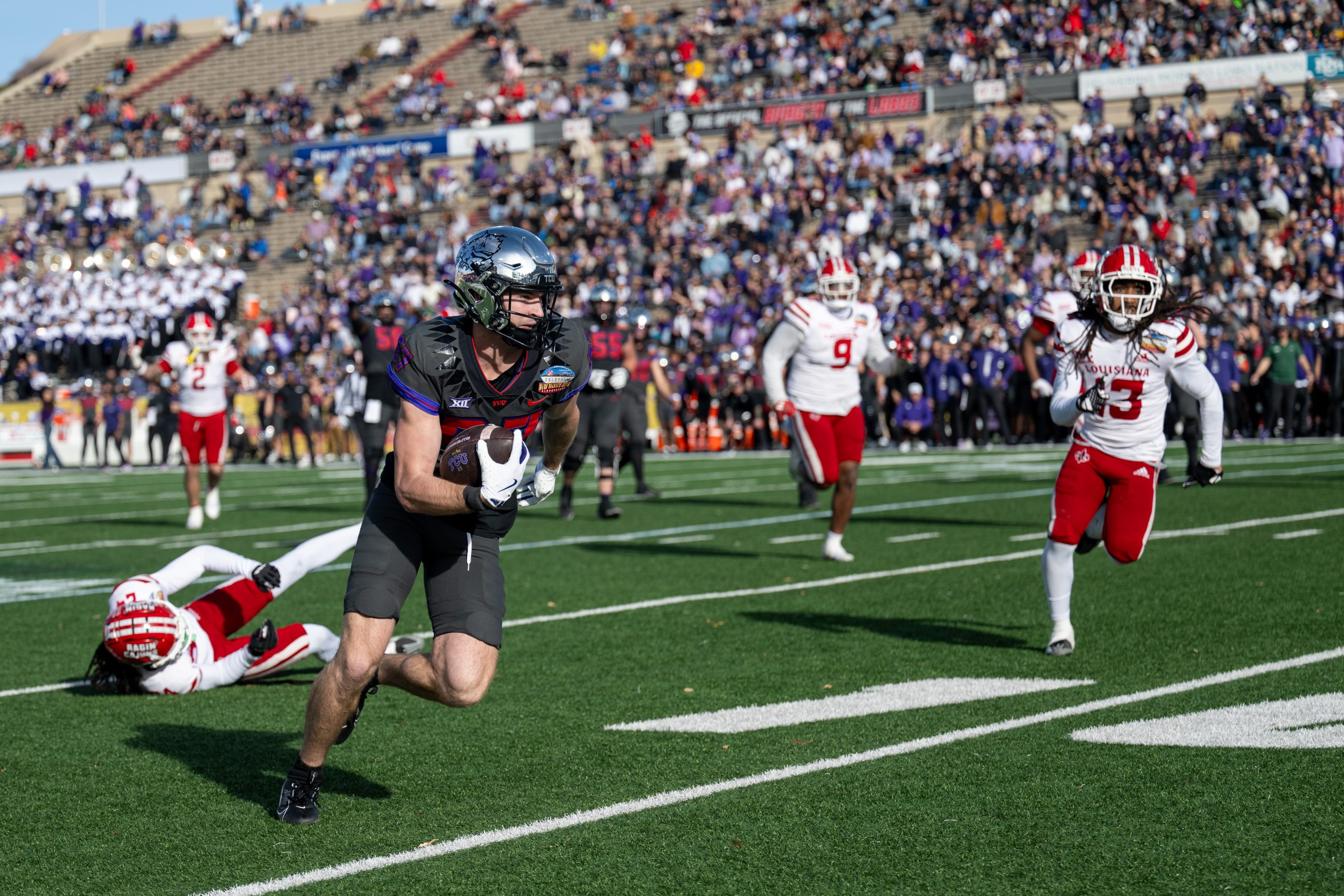 Blake Nowell, Texan Christian University wide receiver, runs the ball for a gain, Dec. 28 in Albuquerque, N.M. Texas Christia