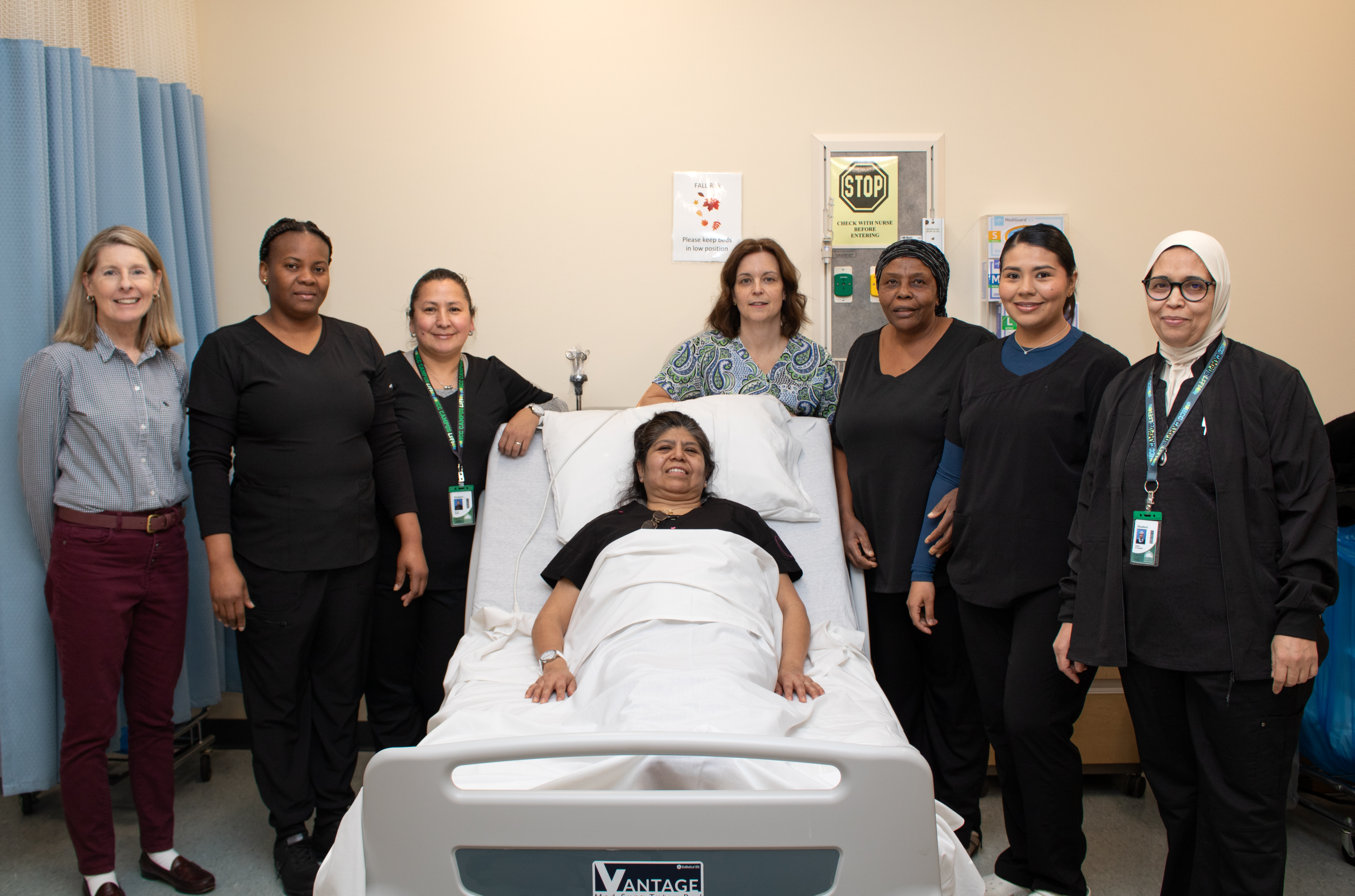 Patient with a team of medical workers