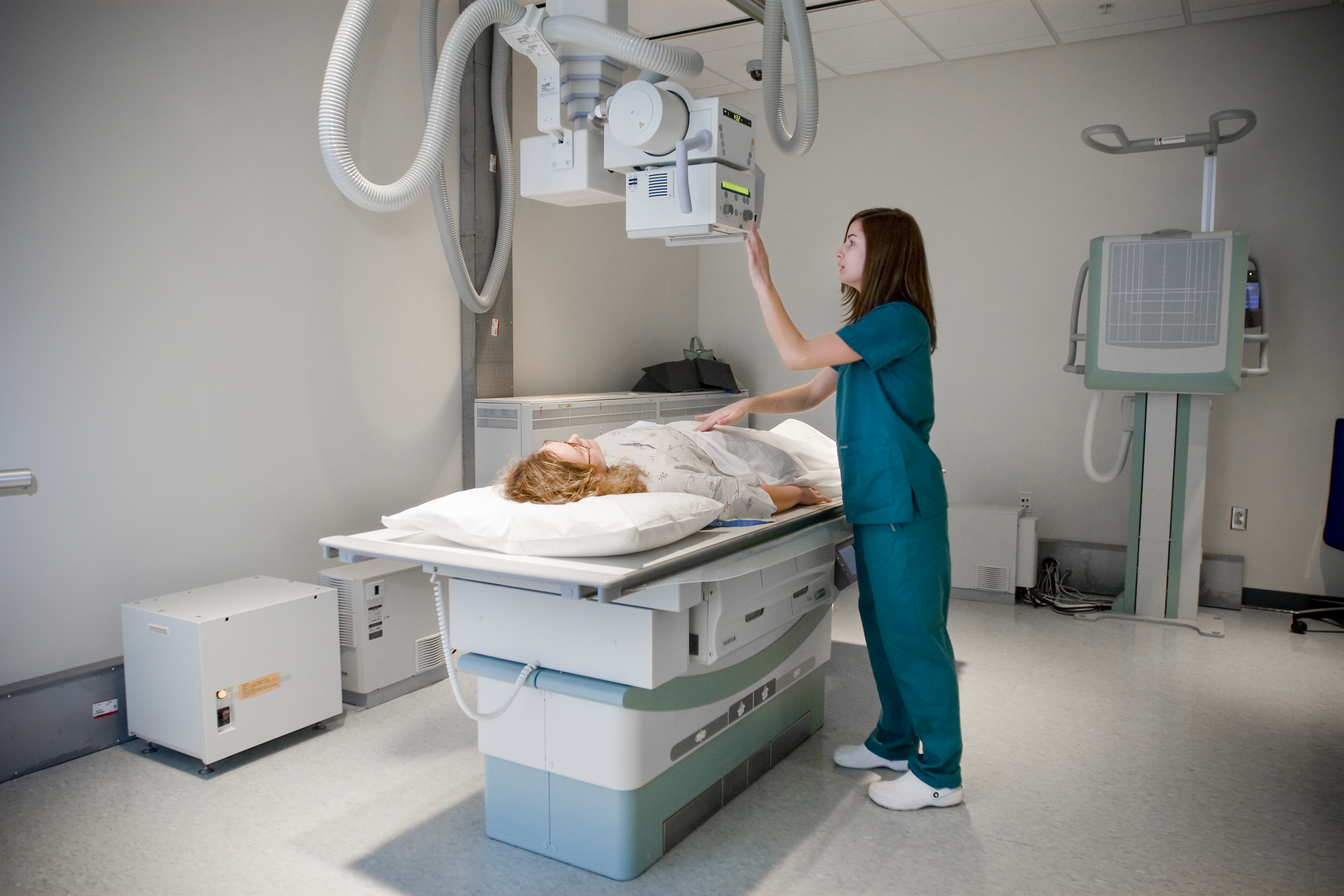 Patient and nurse participating in medical imaging