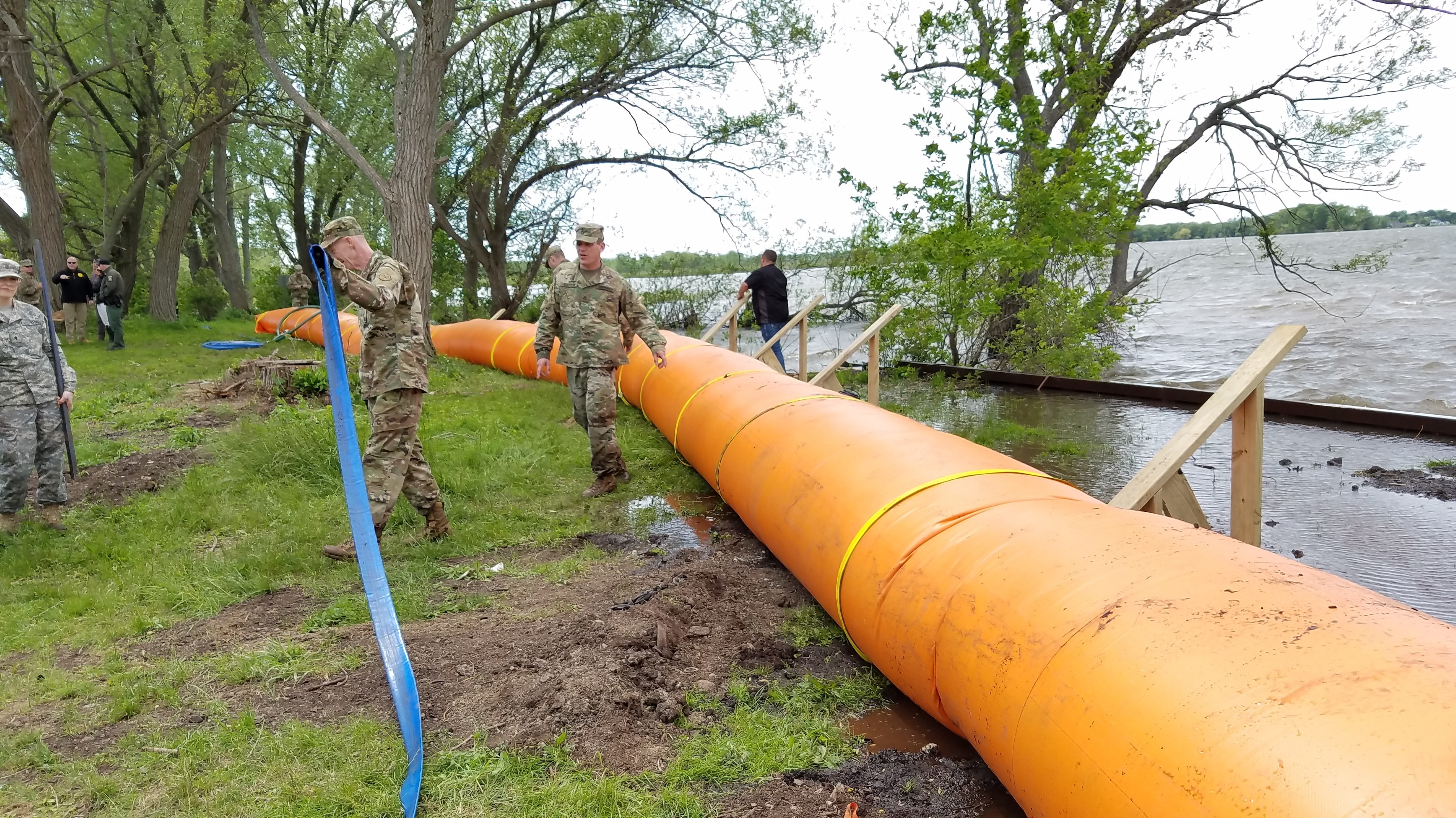 National guard installing temporary dam