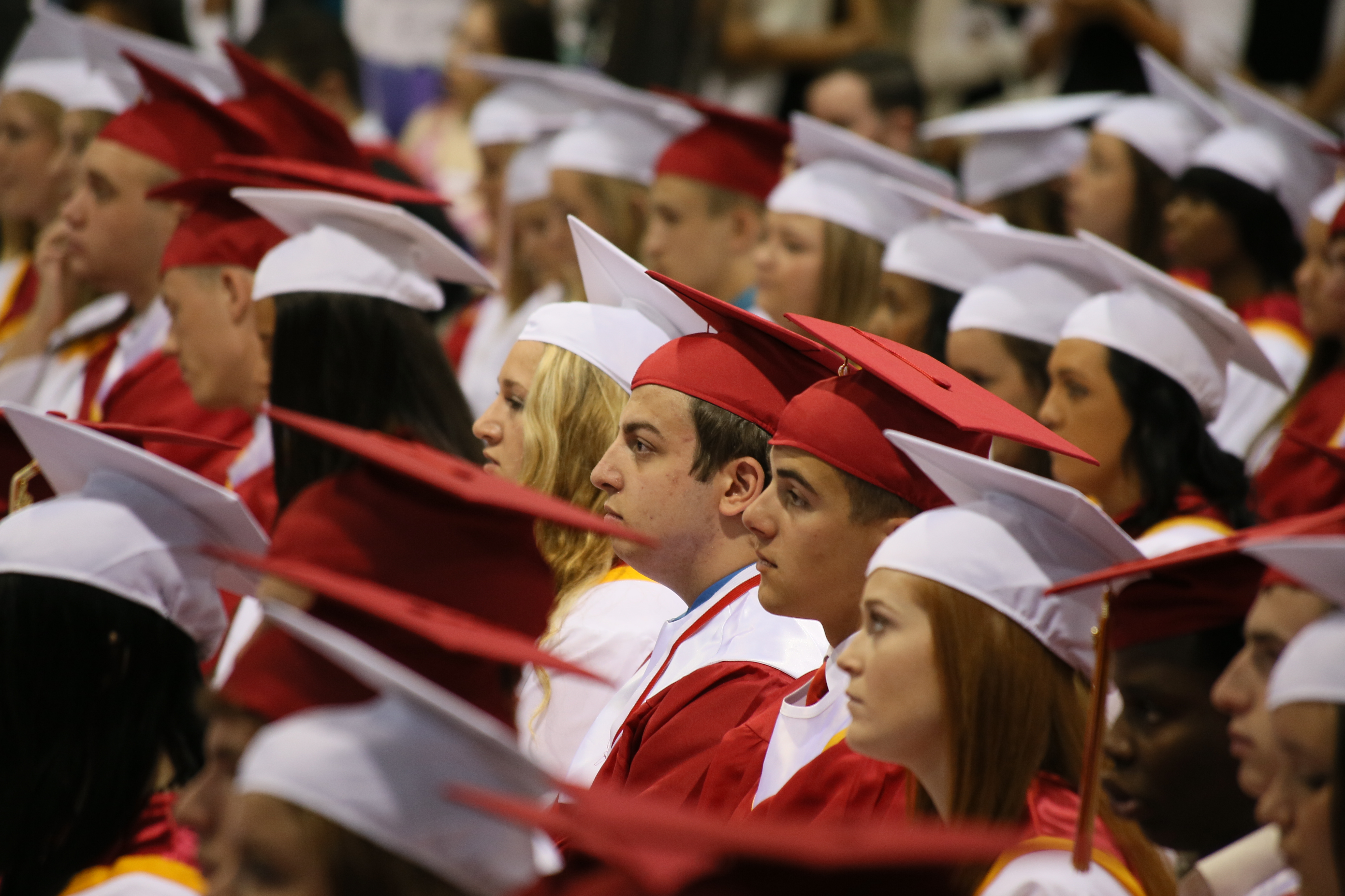 "Graduation of high school students at Archbishop John Carroll High Schoo" by James Capaldi. is licensed under CC BY 2.0