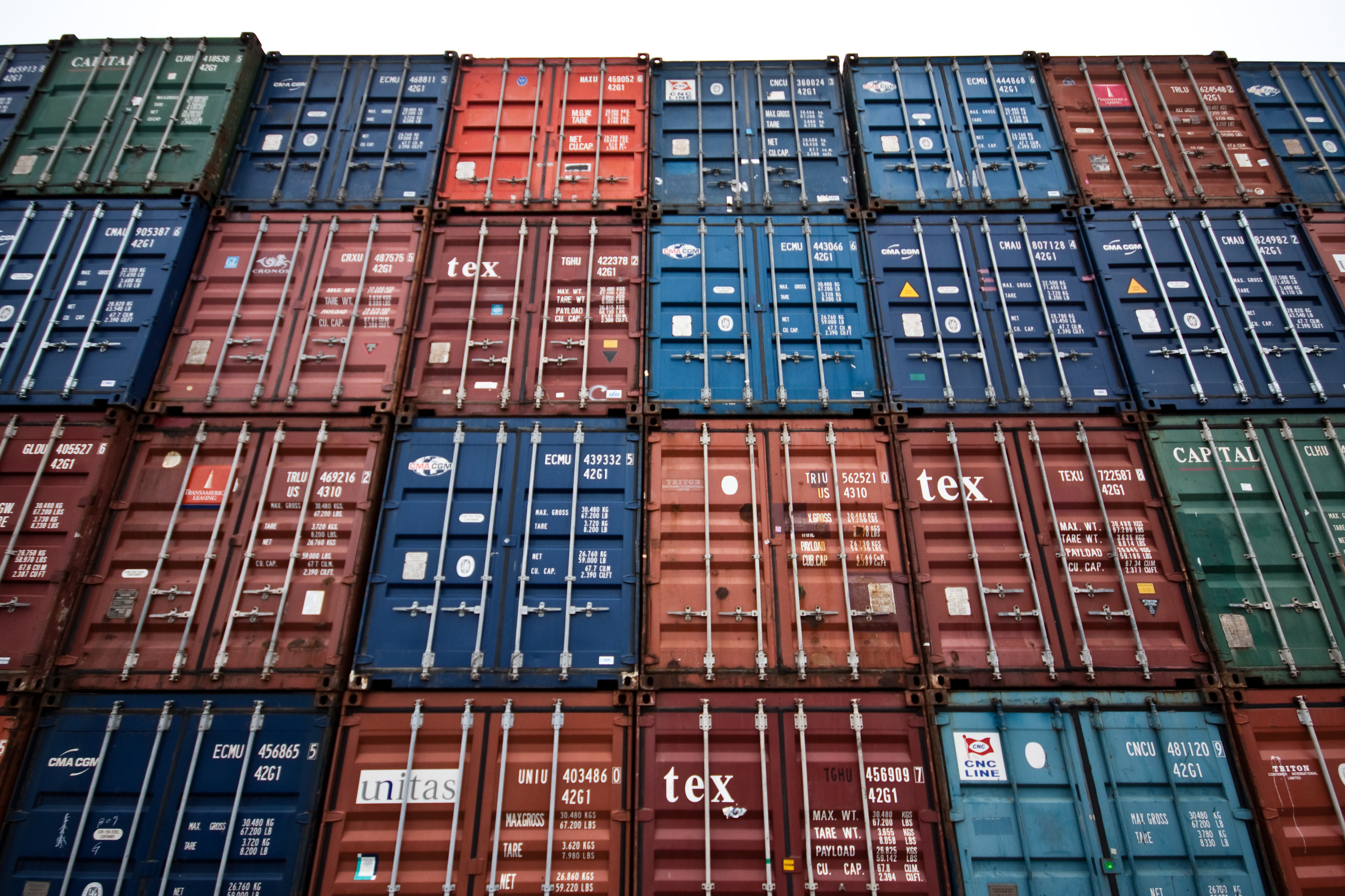 "Towers of multicolored shipping containers." by Michael Petersen is licensed under CC BY 2.0