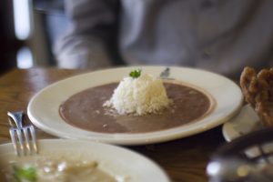 A dish of red beans and rice sits on a table at Willie Mae's Scotch House in New Orleans.